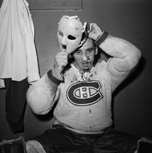 Jacques Plante Putting on Mask